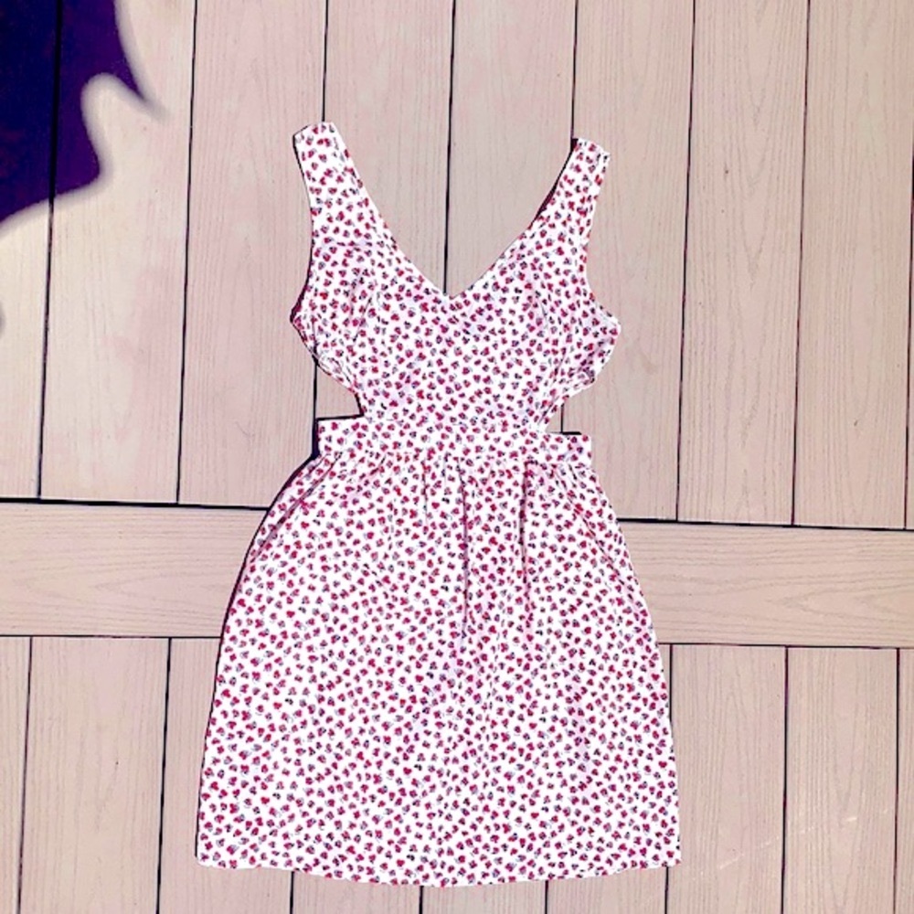 Quiet storm dress with side cut outs
